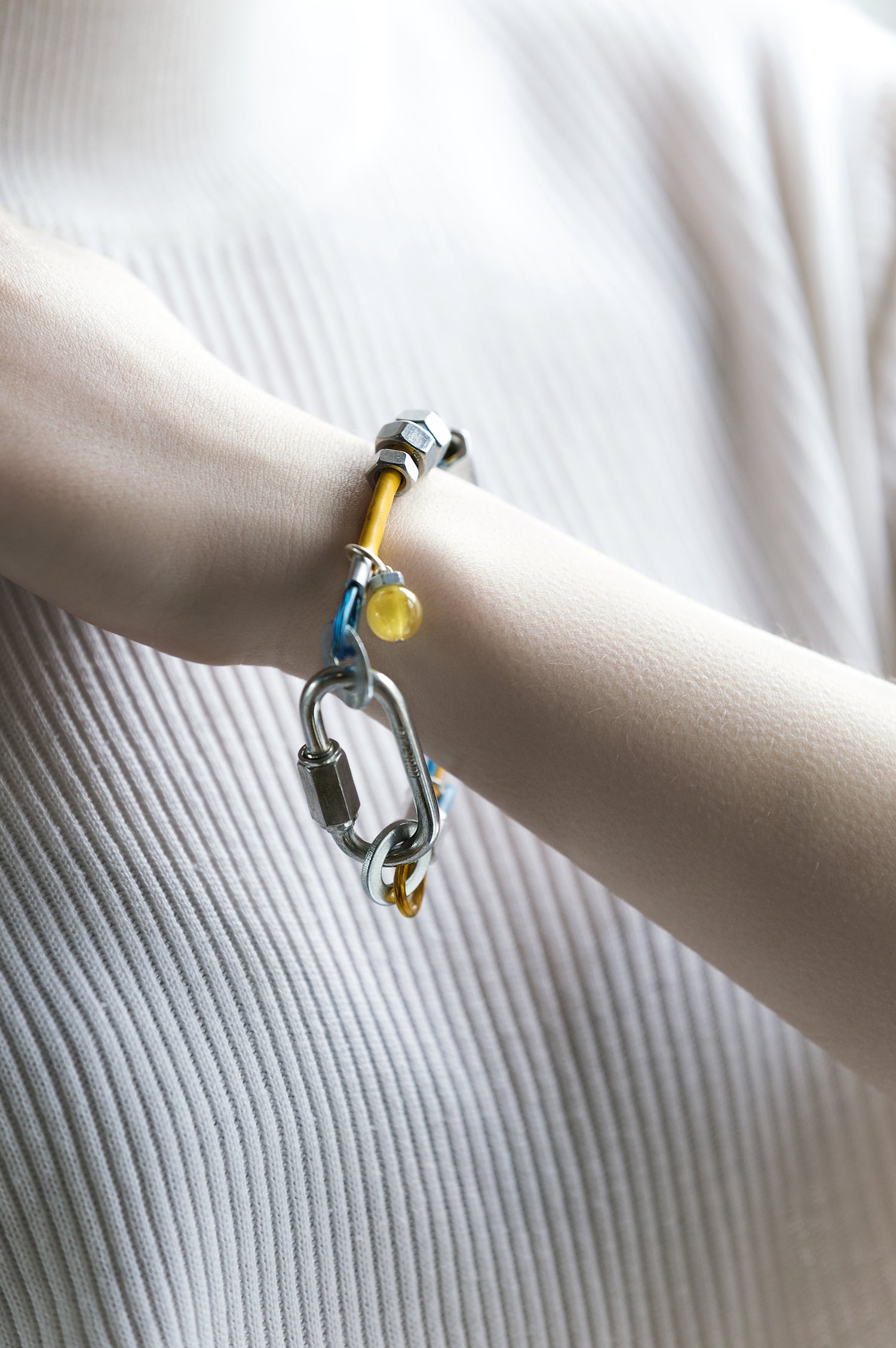 bracelet with metal, silver details and amber stone 